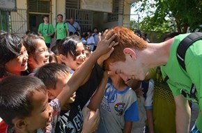 Chinese Children Get Their First Feel of Ginger Hair
