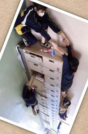 Optical Illusion of the Day: Locker Climbing