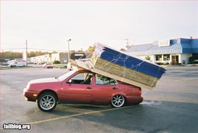 Hauling wood on car Fail