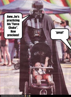 Aww...he's practicing his "Force Choke". How precious!