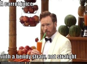 A carrot juice  with a bendy straw, not straight