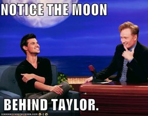 NOTICE THE MOON   BEHIND TAYLOR.