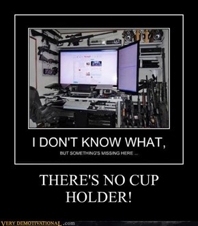 THERE'S NO CUP HOLDER!