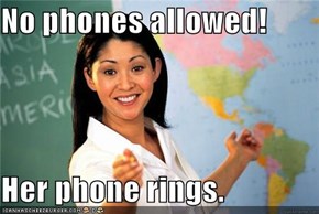 No phones allowed!  Her phone rings.