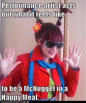 Performance artist acts out what it feels like  to be a McNugget in a Happy Meal.