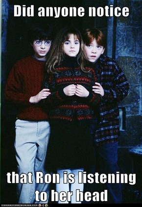 Did anyone notice  that Ron is listening to her head